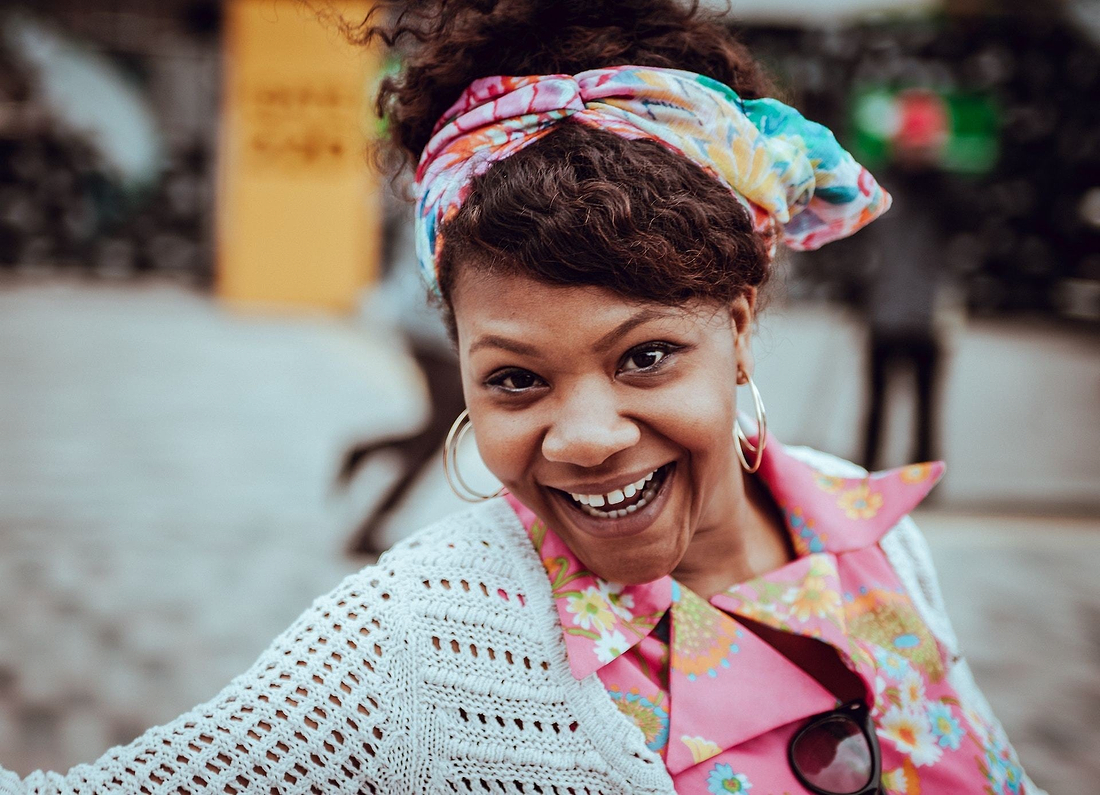 Perimenopause supplements: a smiling woman