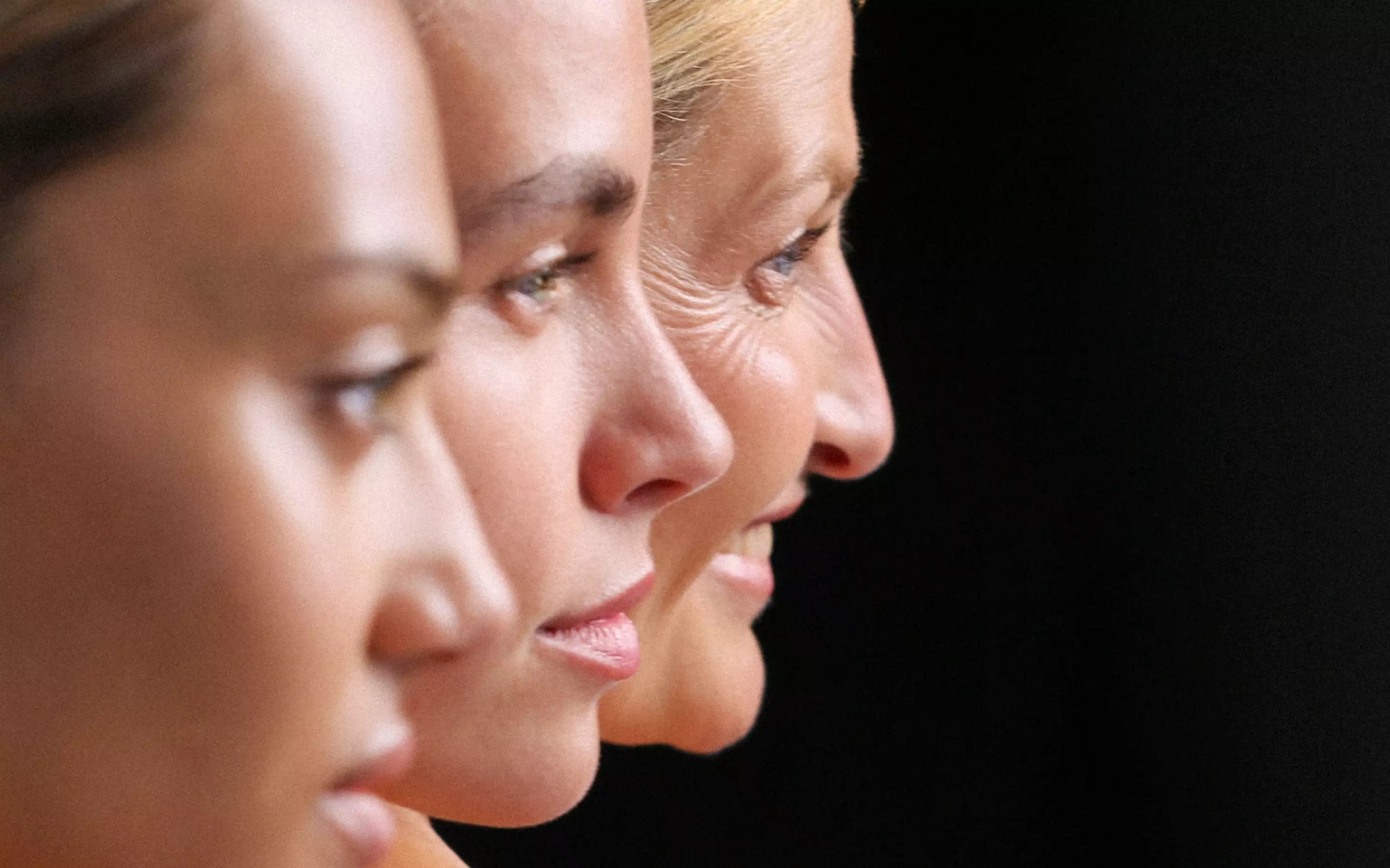 three women of different ages face closeup three women of different ages face closeup
