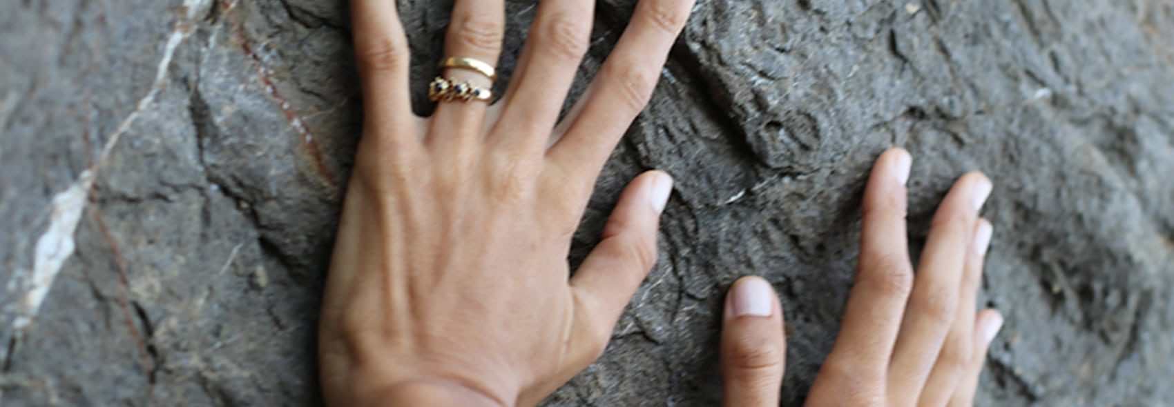 HANDS ON ROCK
