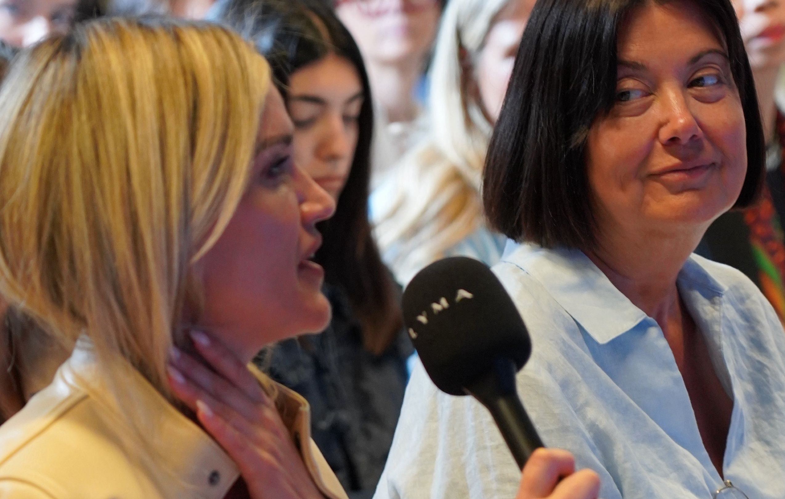 Audience member asking questions during LYMA lecture