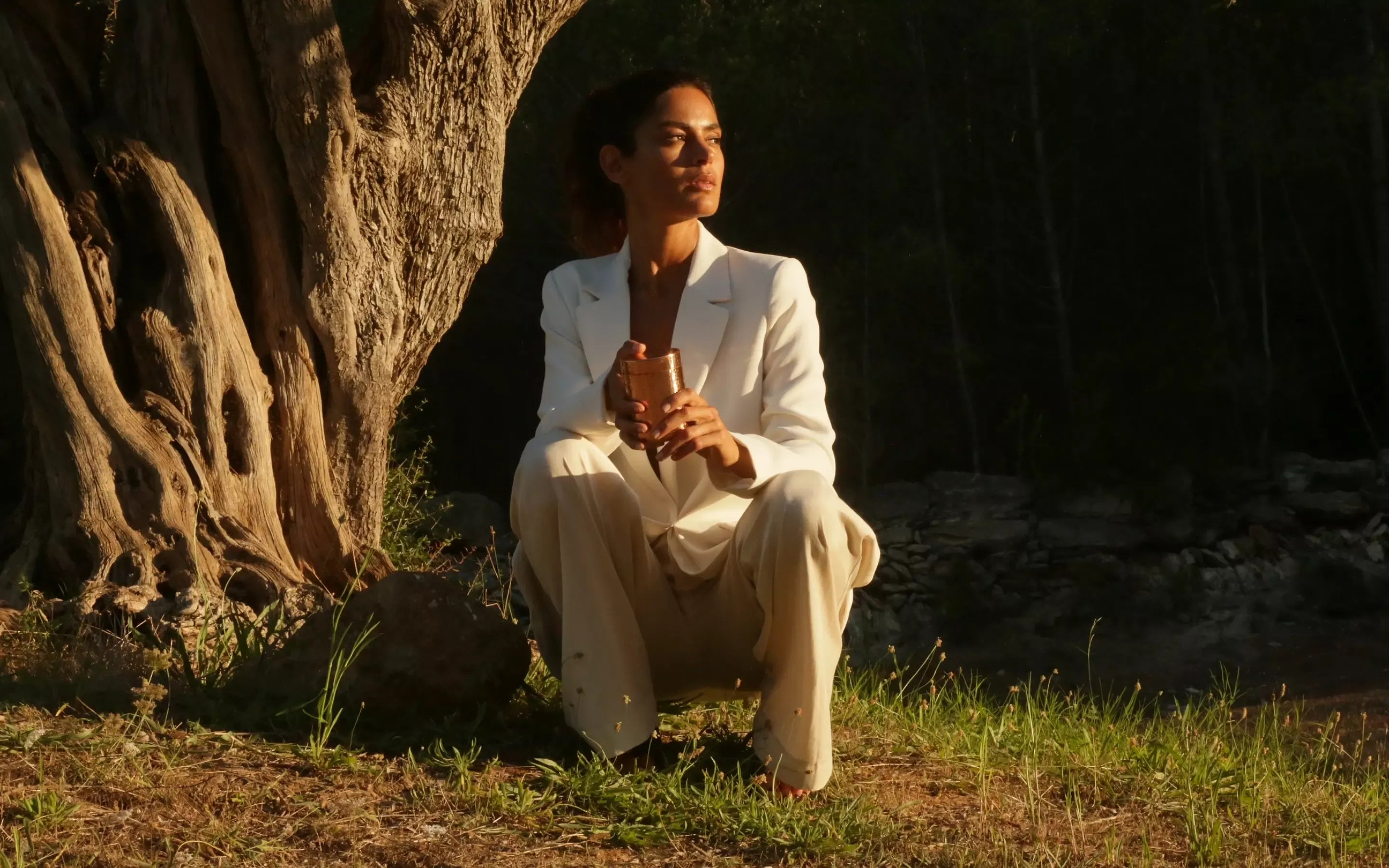 woman sitting in nature