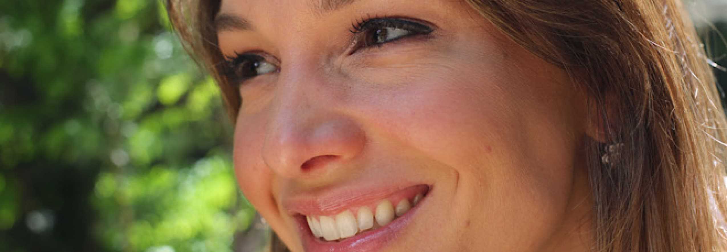 Lady smiling thanks to menopause supplement