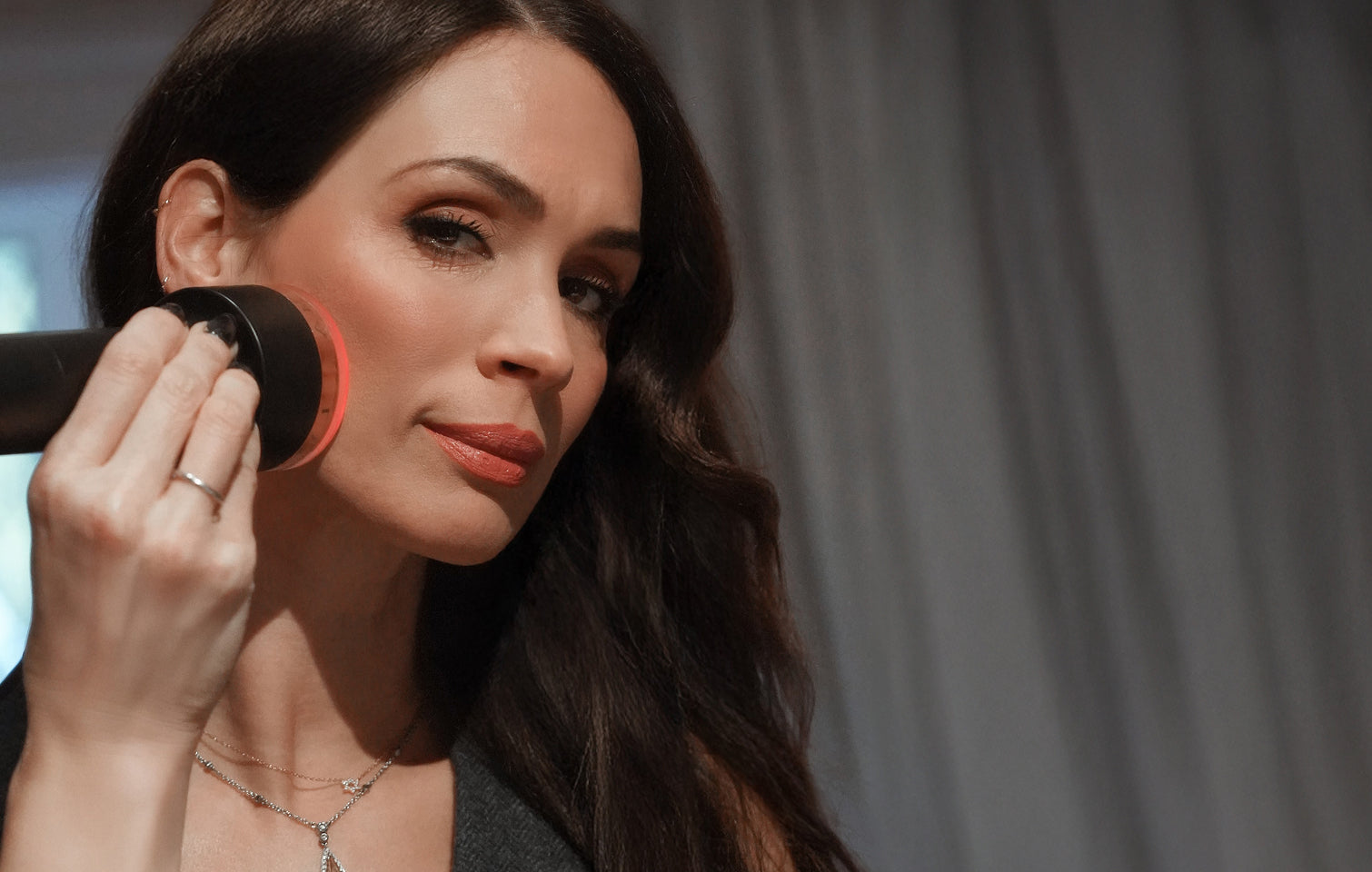 Customer Orly using LYMA Laser Pro for jawline tightening and skin treatment