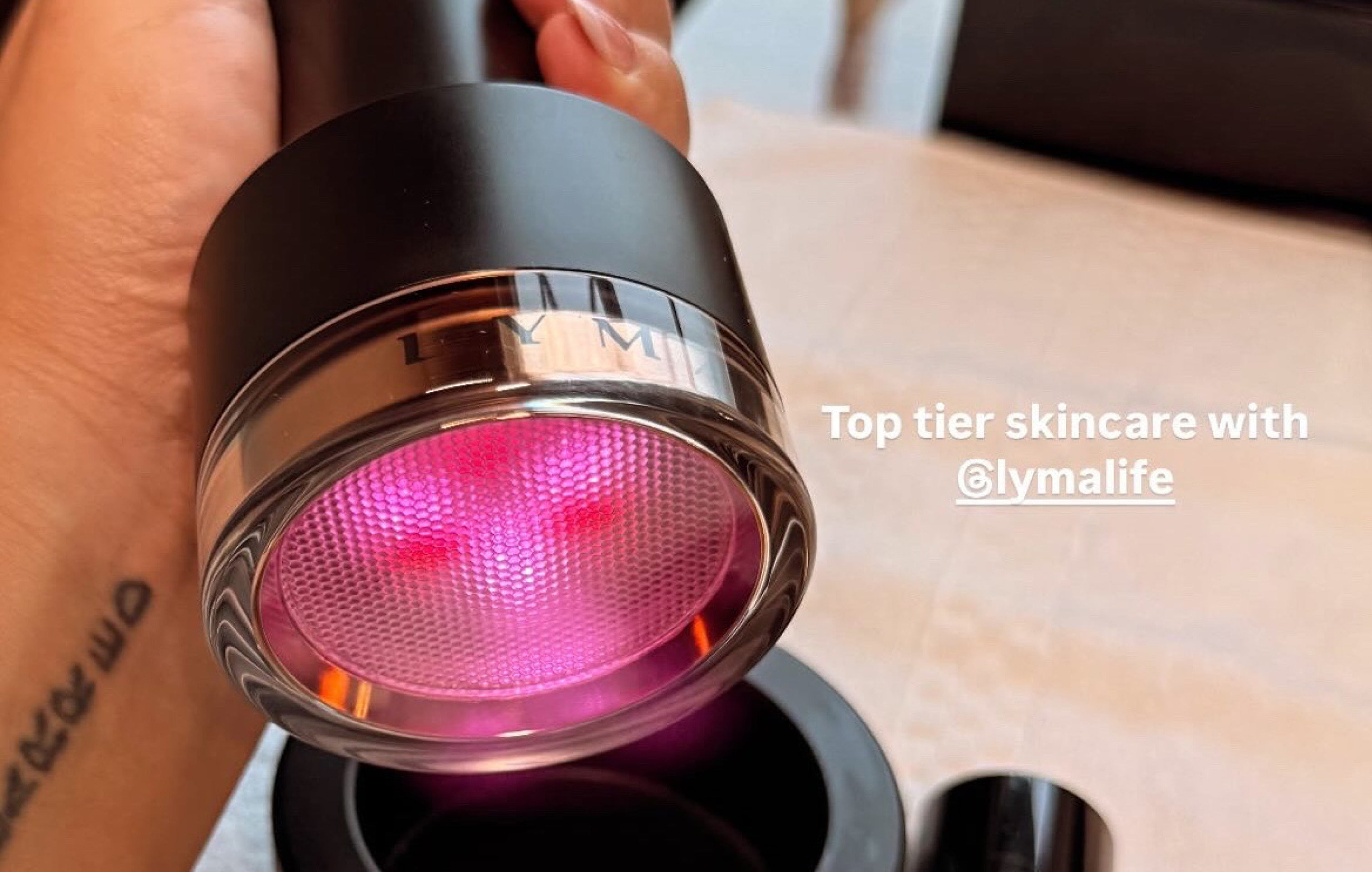 Celebrity holding LYMA Laser PRO close-up before MET Gala