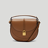 The Siena saddle crossbody bag tan small grain 1