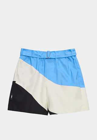 MSGM tidal wave patterned gabardine Bermuda shorts in blue, cream, and black, luxury fashion online.