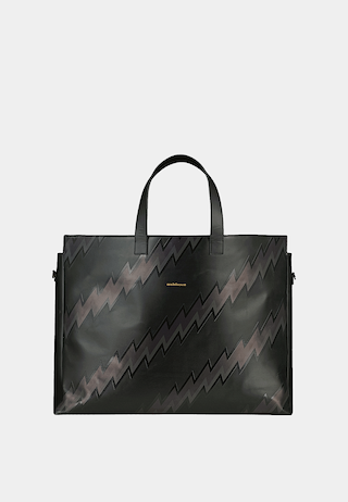Ashluxe Female Zig Zag Leather Bag in Black with bold black zigzag pattern, structured design, and top handles.
