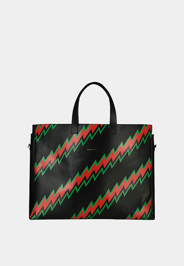 Ashluxe Female Zig Zag Leather Maxi Bag in Black with bold red and green zigzag pattern, structured design, and top handles.