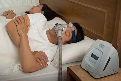 a man using a cpap machine