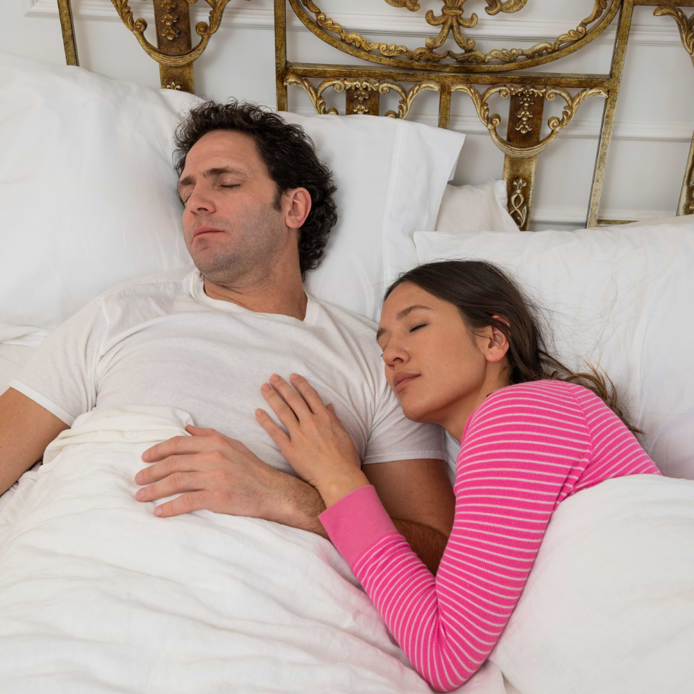 snore guards being held infront of light blue background