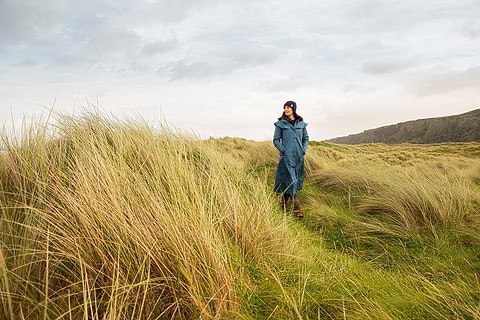 Heritage waterproof coats displayed outdoors