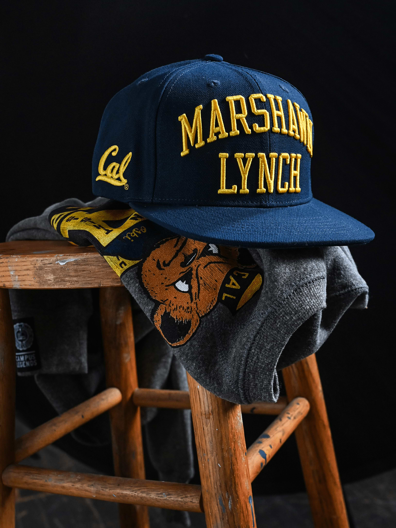 CAL - Marshawn Lynch 10 Navy Snapback Hat - Roots of Fight Canada