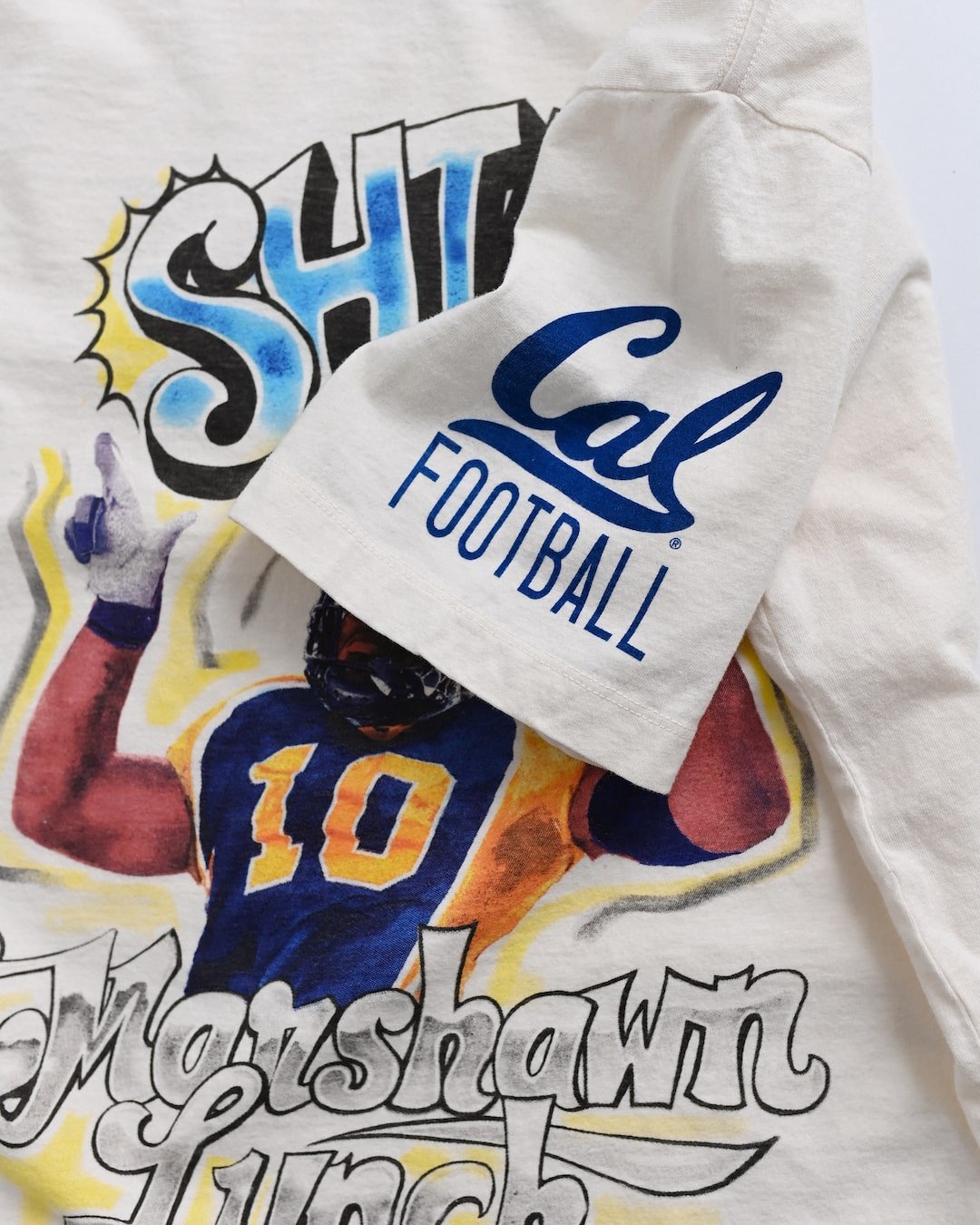 CAL - Marshawn Lynch Shinin' 365 White Tee - Roots of Fight Canada