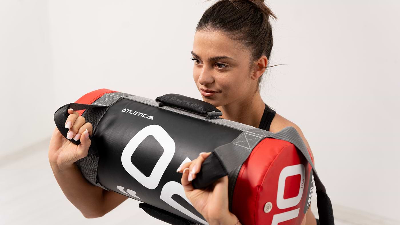 Warm-up equipment: sandbag kniebuiging