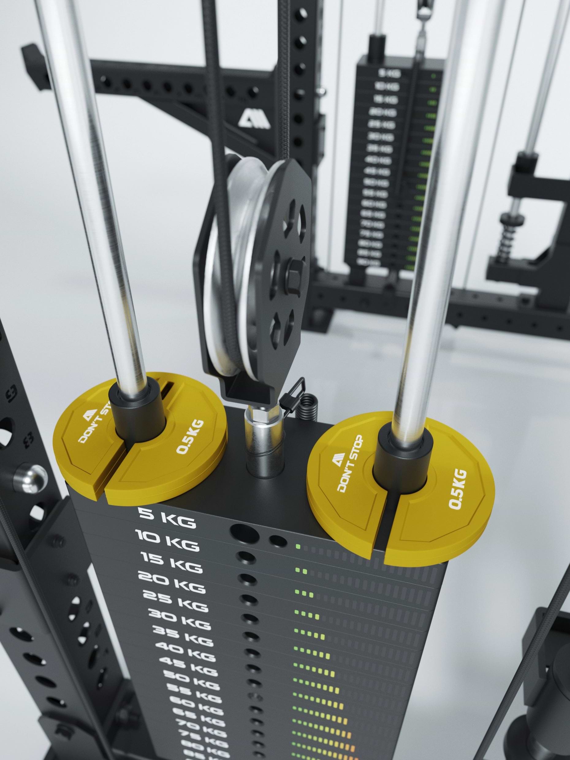 gelbe Add On Flex Hantelscheiben an dem Gewichtsblock eines Kabelzugs