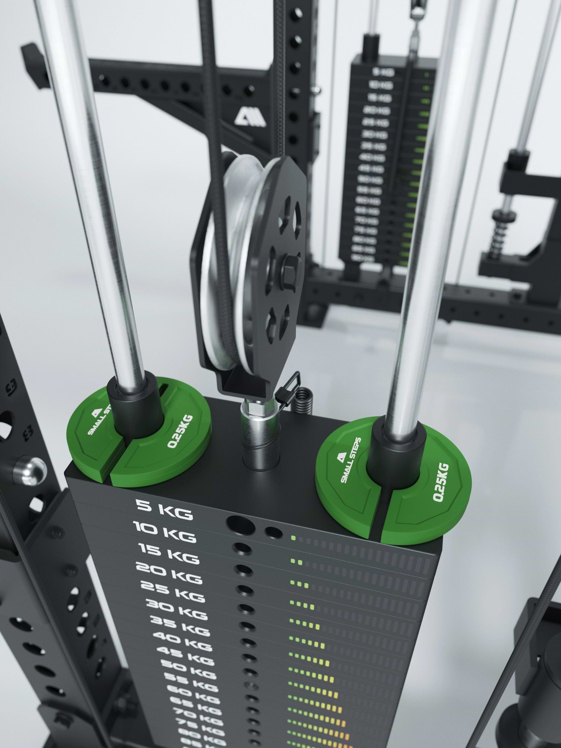 grüne Add On Flex Hantelscheiben an dem Gewichtsblock eines Kabelzugs