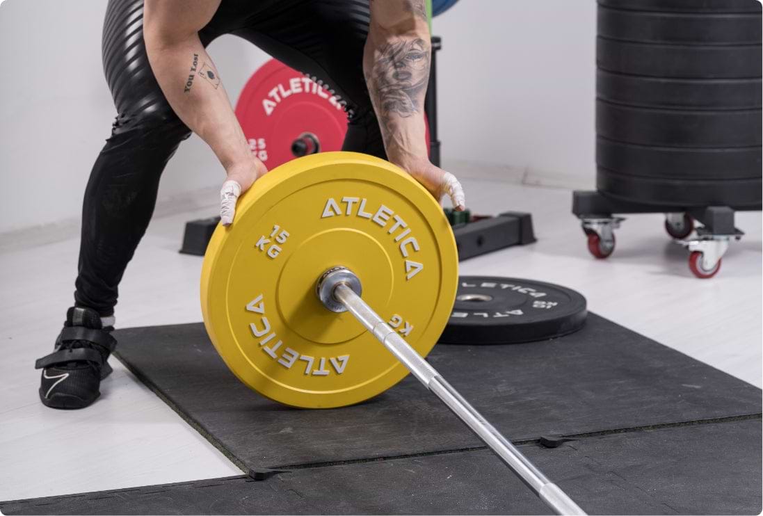 Omega Langhantel mit mit IPF- und IWF-Markierungen, 190.000 PSI Zugfestigkeit, Beladen der Hantel mit Bumper Plates