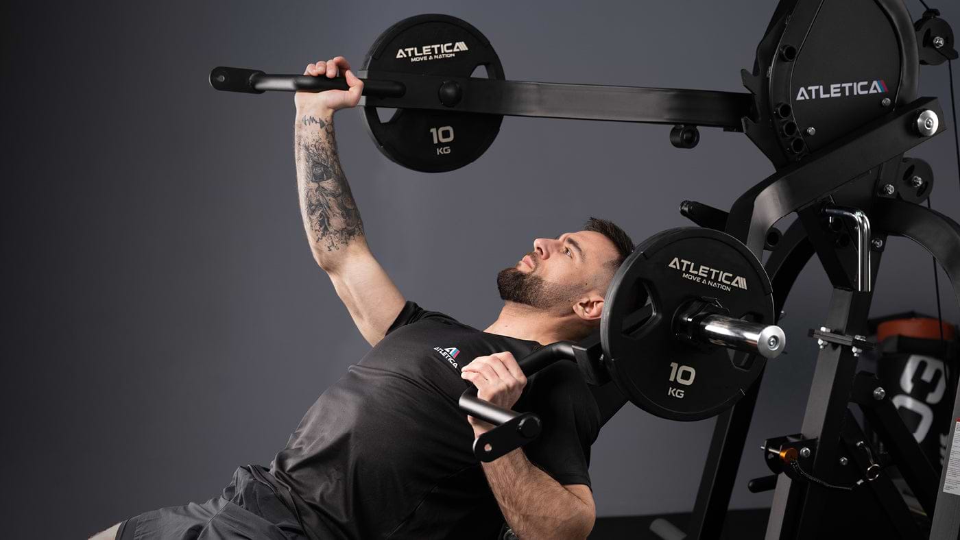 Shoulder press on the X-Tron Multigym