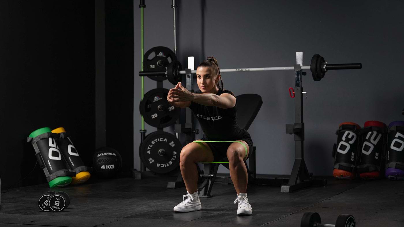 Kniebeuge mit Mini-Band