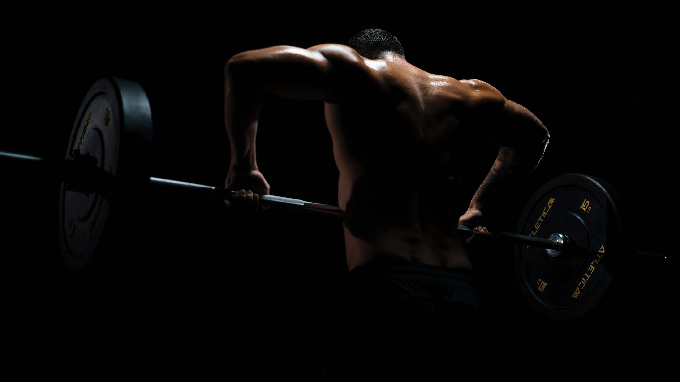 Clean and Jerk Ausführung mit geladener Langhantel