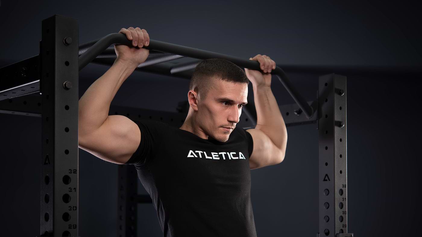 Pull-ups on the pull-up bar at the power rack