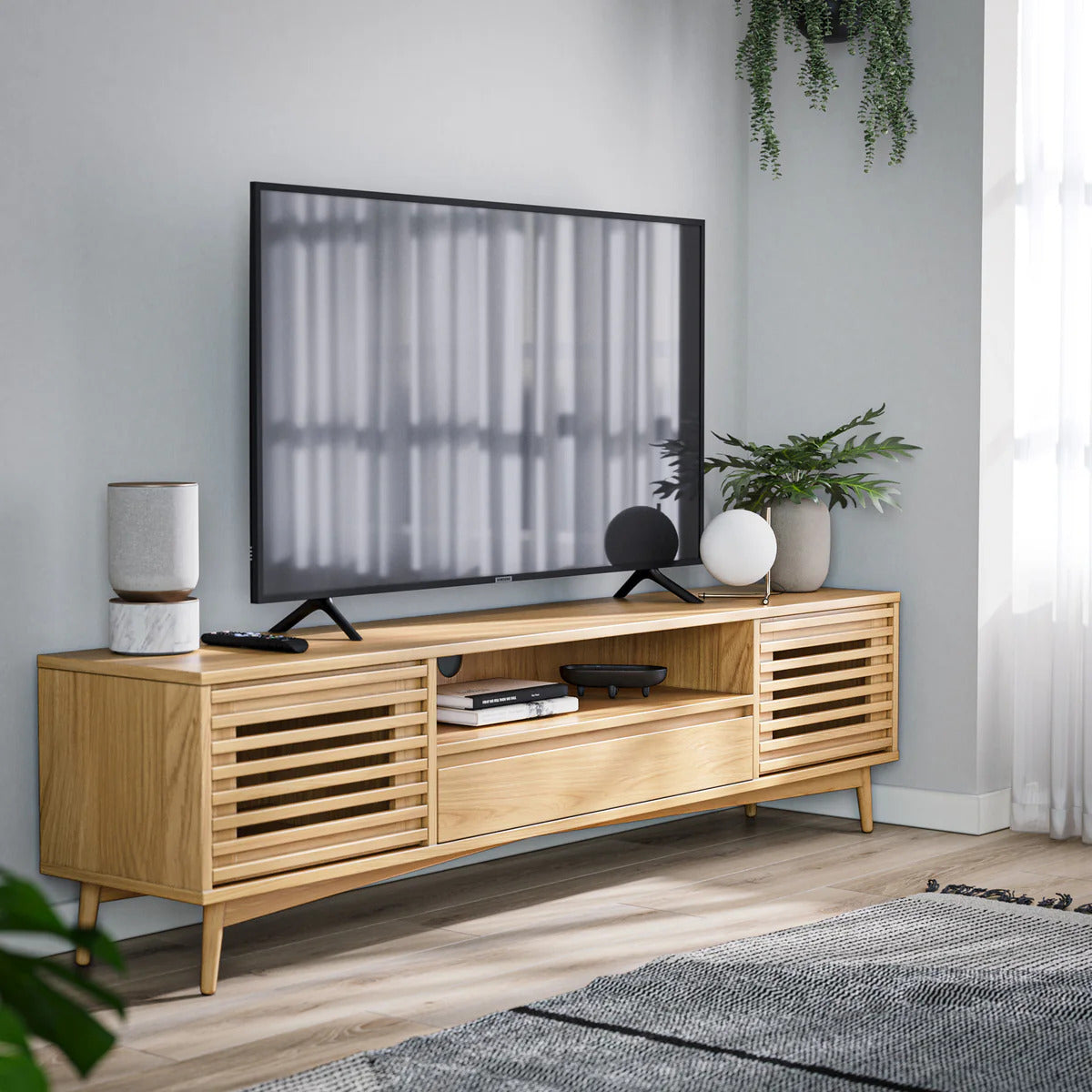 Mixing and matching: pairing TV stands with other furniture