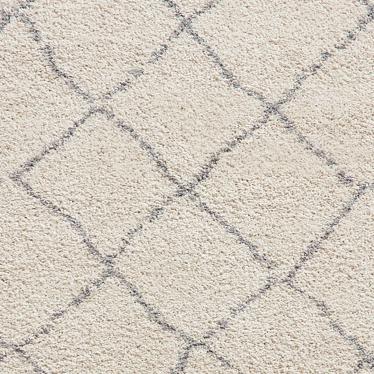 Cream Willow Shaggy Tasselled Diamond Rug from Roseland Furniture