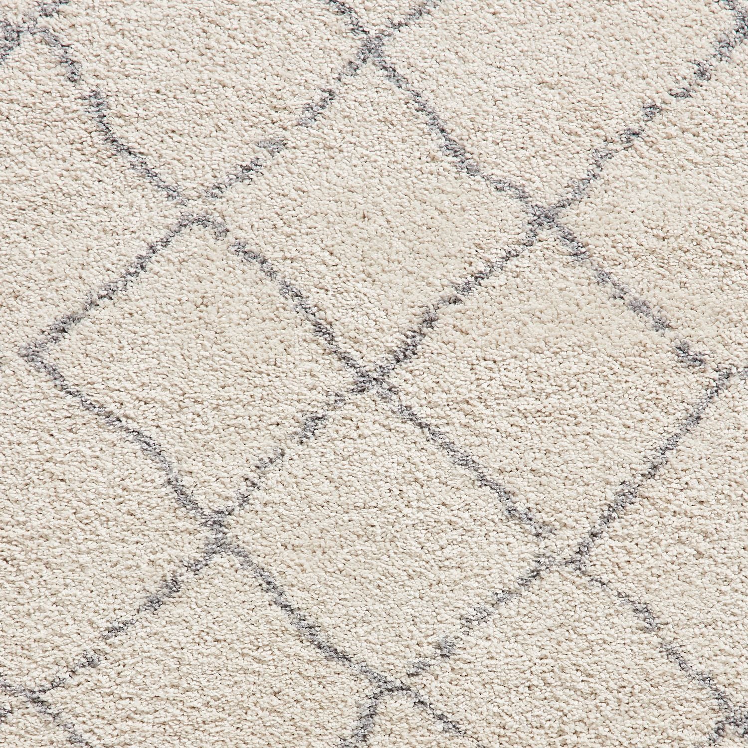 Cream Willow Shaggy Tasselled Diamond Rug from Roseland Furniture