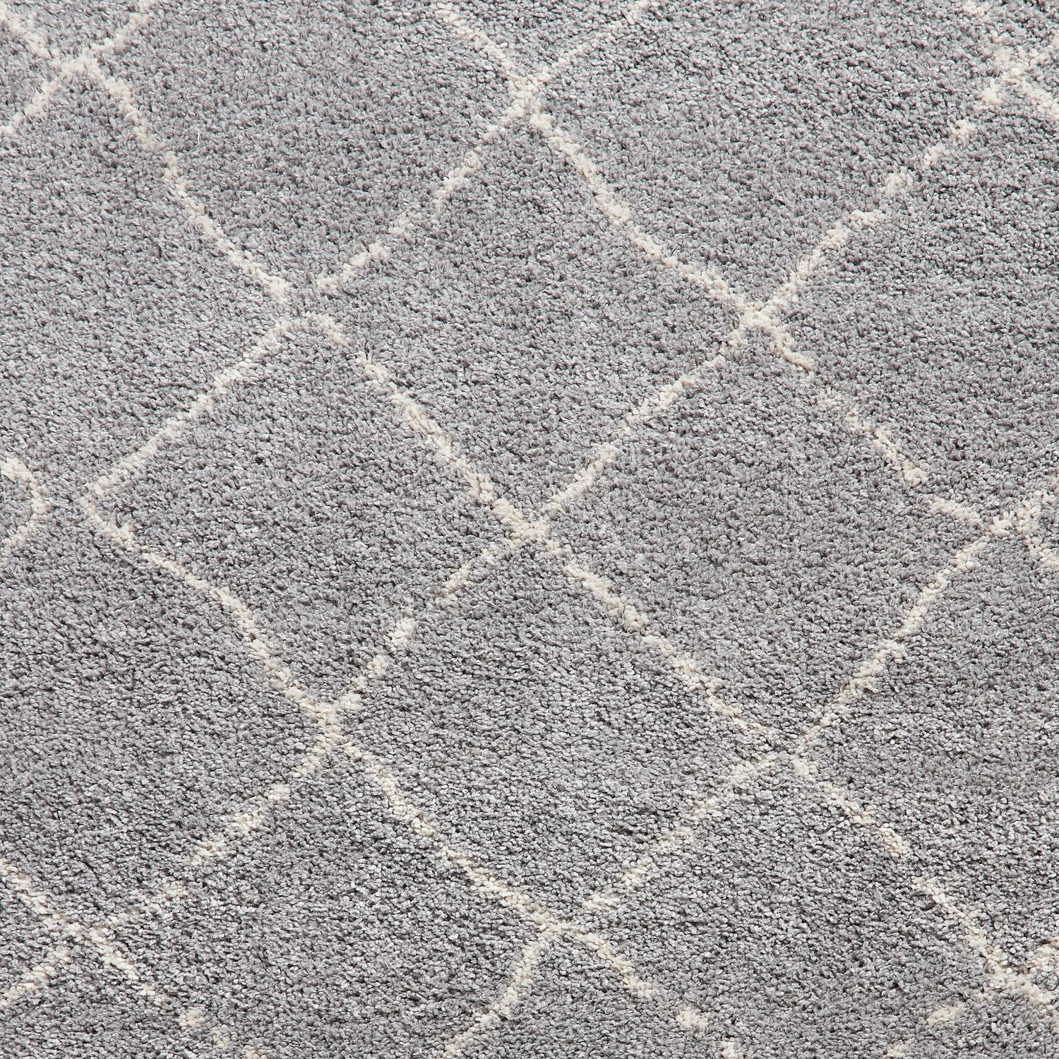 Grey Willow Shaggy Tasselled Diamond Rug from Roseland Furniture