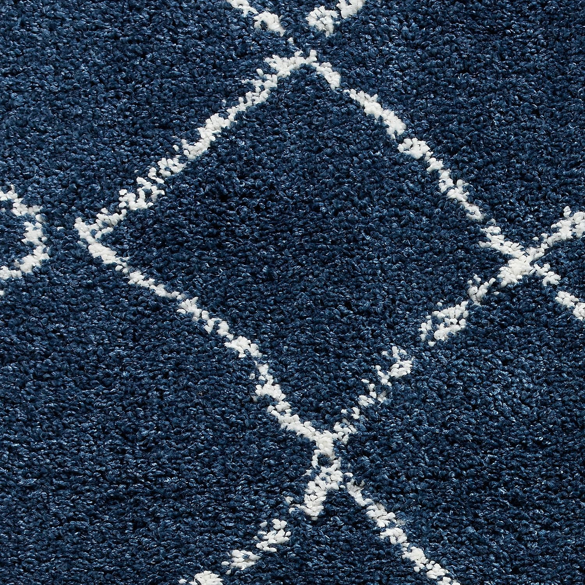 Navy Willow Shaggy Tasselled Diamond Rug from Roseland Furniture