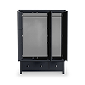 A black wardrobe with open doors, revealing a spacious, empty interior, stands against a white background. Below the cabinet section, a drawer is visible.