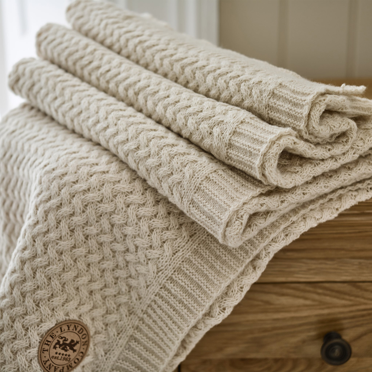 TLC Cadenza Knitted Throw 130x170cm Cream from Roseland Furniture