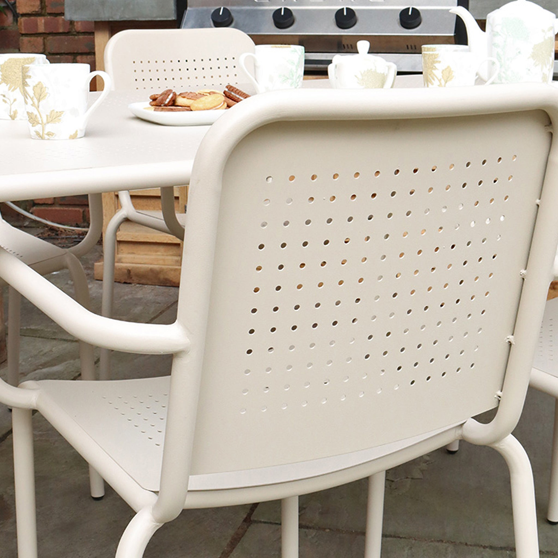 Porto Champagne 6 Seater Round Dining Set from Roseland Furniture