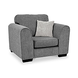 Thornby Standard Armchair Charcoal Light Grey from Roseland Furniture postitioned at an angle highlighting the black legs and textured details of the armchair with simple piping around the edges and a light grey cushion