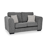 Thornby 2 Seater Sofa Charcoal Light Grey from Roseland Furniture postitioned at an angle highlighting the black legs and textured details of the sofa with simple piping around the edges and two cream cushions.