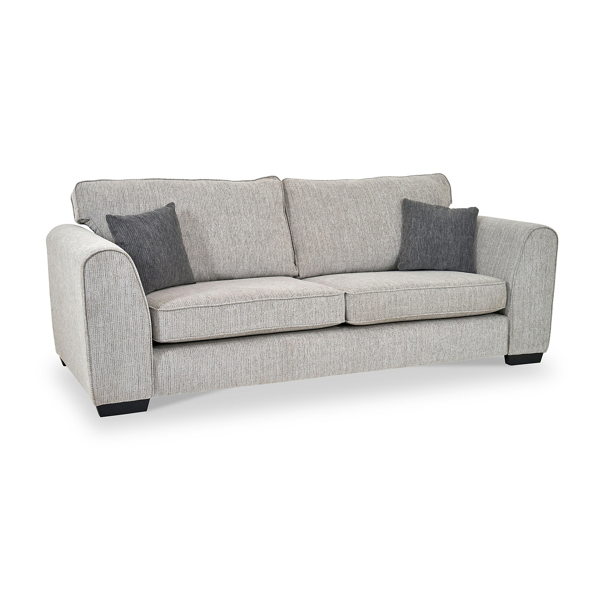 Thornby 4 Seater Sofa Light Grey Charcoal from Roseland Furniture postitioned at an angle highlighting the black legs and textured details of the sofa with simple piping around the edges and two grey cushions.