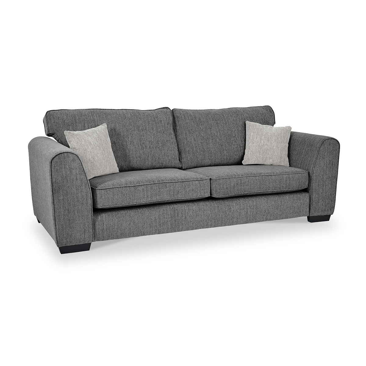 Thornby 4 Seater Sofa Charcoal Light Grey from Roseland Furniture postitioned at an angle highlighting the black legs and textured details of the sofa with simple piping around the edges and two cream cushions.