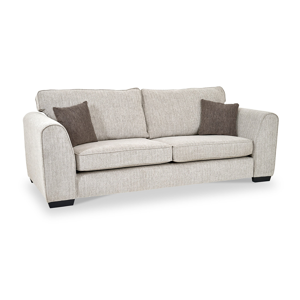 Thornby 4 Seater Sofa Natural Mink from Roseland Furniture postitioned at an angle highlighting the black legs and textured details of the sofa with simple piping around the edges and two Brown cushions.