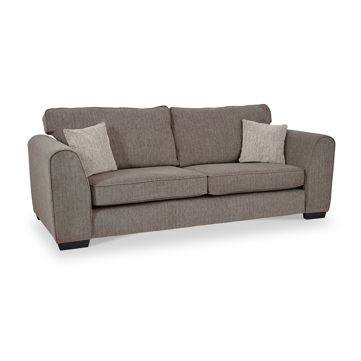 Thornby 4 Seater Sofa Mink Natural from Roseland Furniture postitioned at an angle highlighting the black legs and textured details of the sofa with simple piping around the edges and two mink cushions