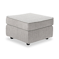 Thornby Standard Footstool Light Grey Charcoal from Roseland Furniture positioned at an angle to display the black legs and the texture of the footstool