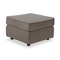 Thornby Standard Footstool Mink from Roseland Furniture positioned at an angle to display the black legs and the texture of the footstool