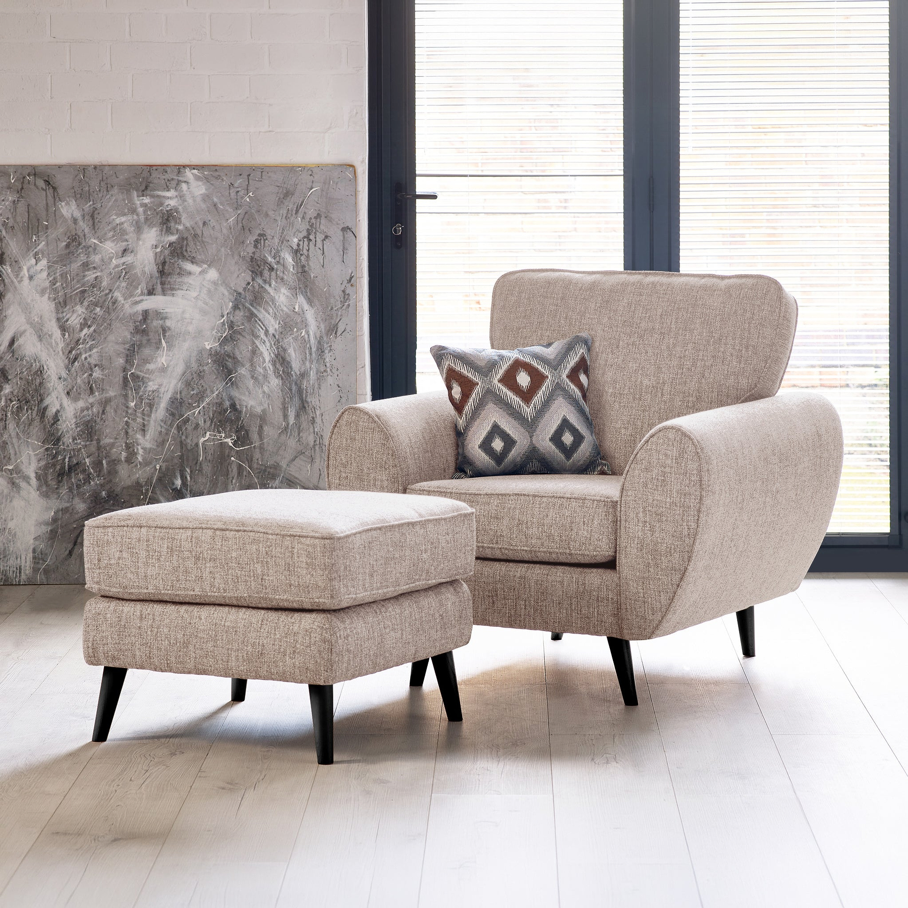Northwick Armchair and footstool Beige with Dark Leg from Roseland Furniture