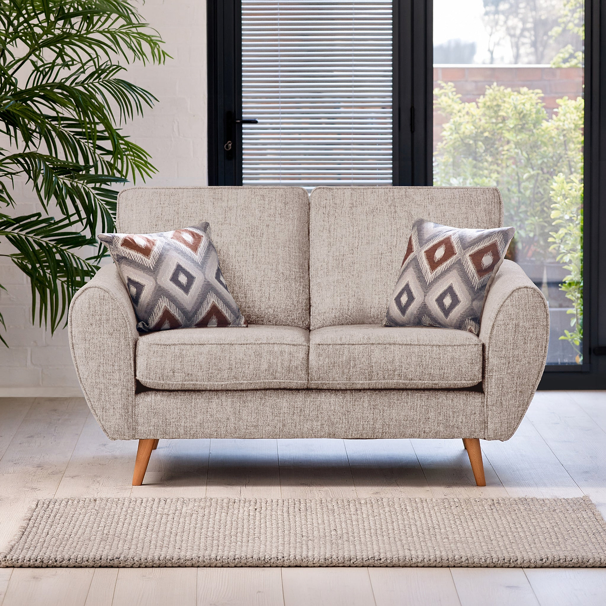 Northwick 2 Seater Sofa Beige with Light Leg from Roseland Furniture