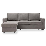 A grey L-shaped sectional sofa with three back cushions and an extended chaise, standing against a white background.