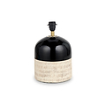 A black and beige lamp base stands centrally, featuring a glossy top half and a textured lower section, isolated against a white background.