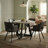Saltaire Industrial Grey Concrete Round Dining Table from Roseland Furniture
