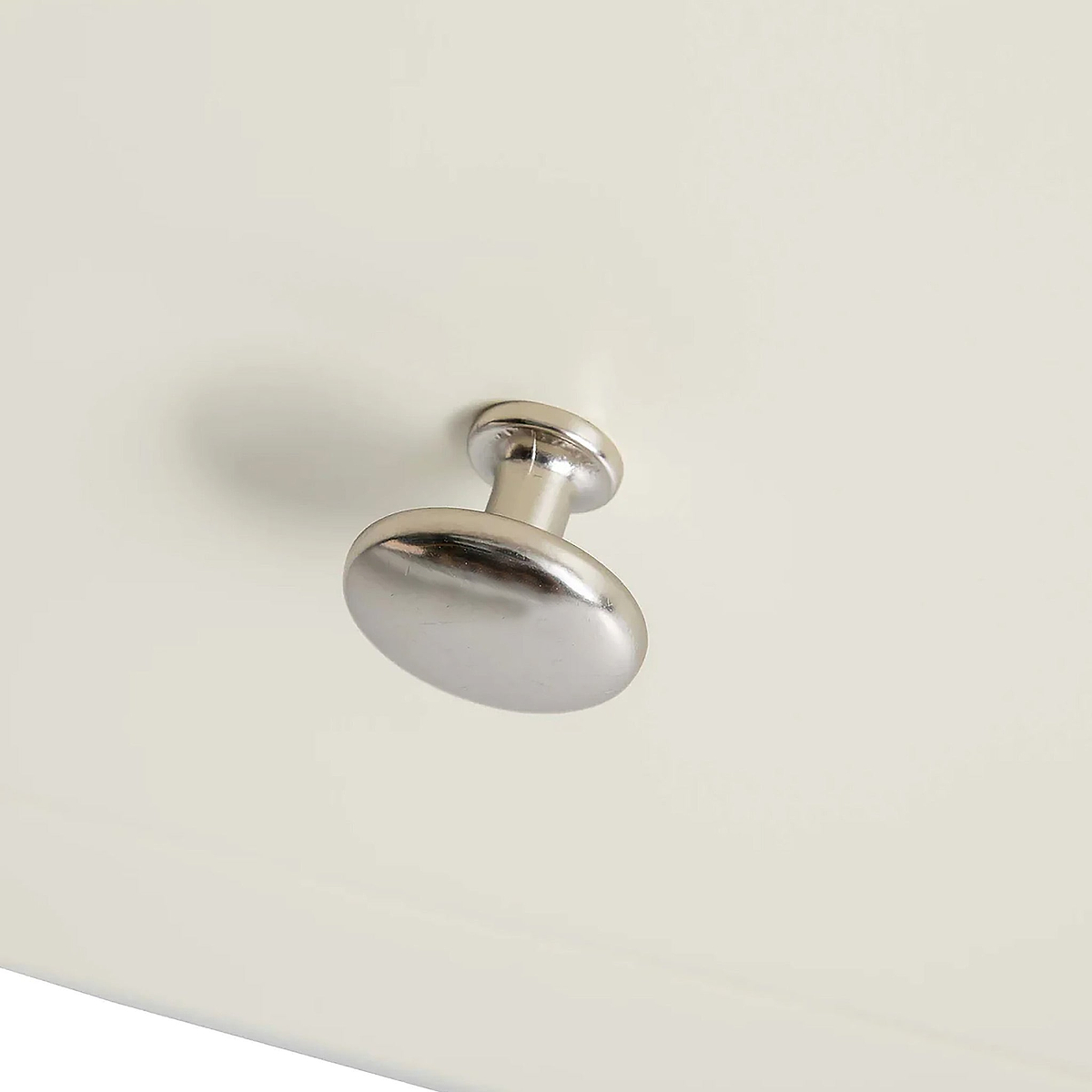 Farrow XL Cream 2 Over 3 Chest Of Drawers from Roseland Furniture - close up of silver knobs