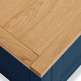 Farrow XL Navy 2 Over 3 Chest Of Drawers from Roseland Furniture - close up of wooden top