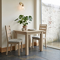 Trelan-Oak-80cm-Square-Bistro-Dining-Table from Roseland Furniture