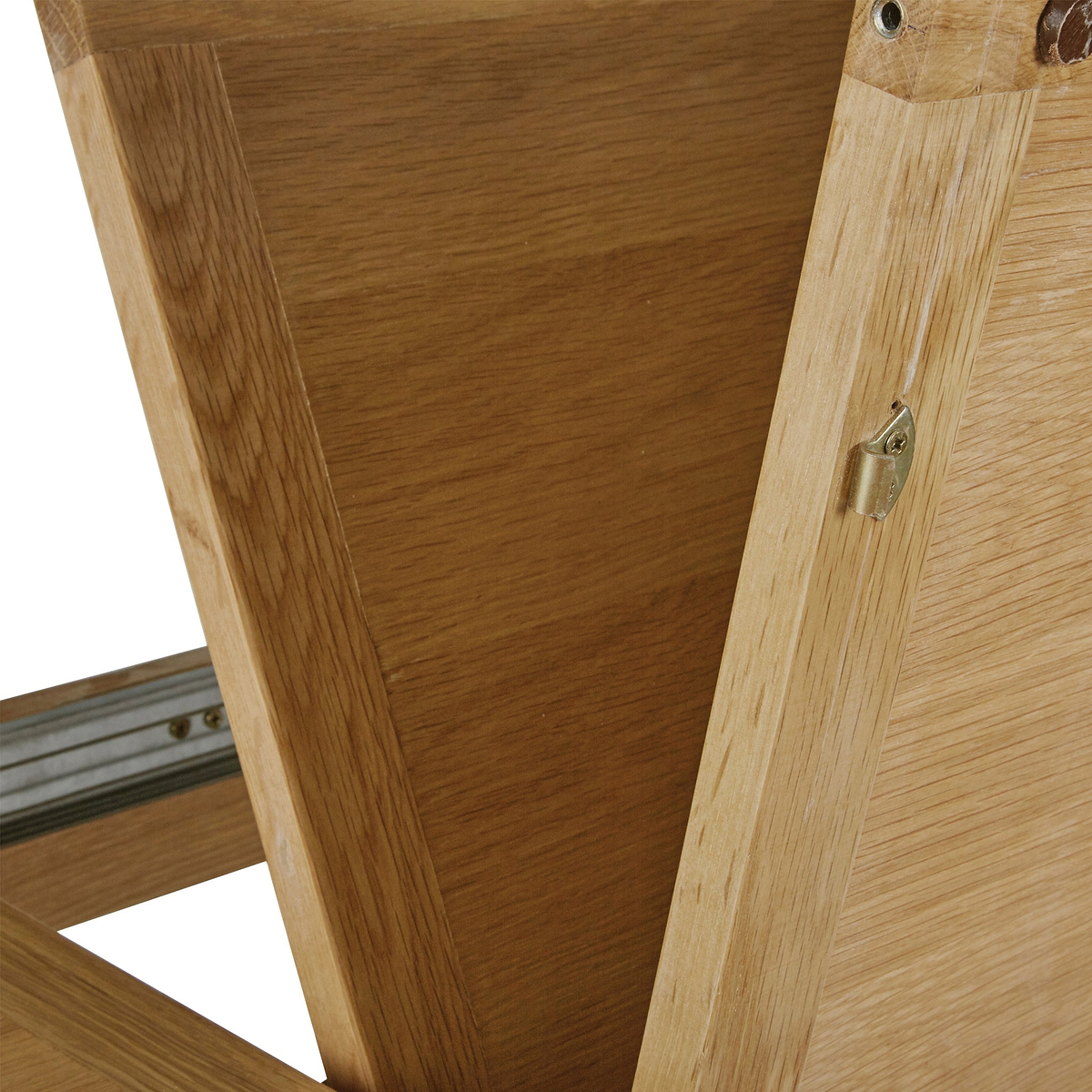 Lanner Oak Compact Extending Dining Table from Roseland Furniture